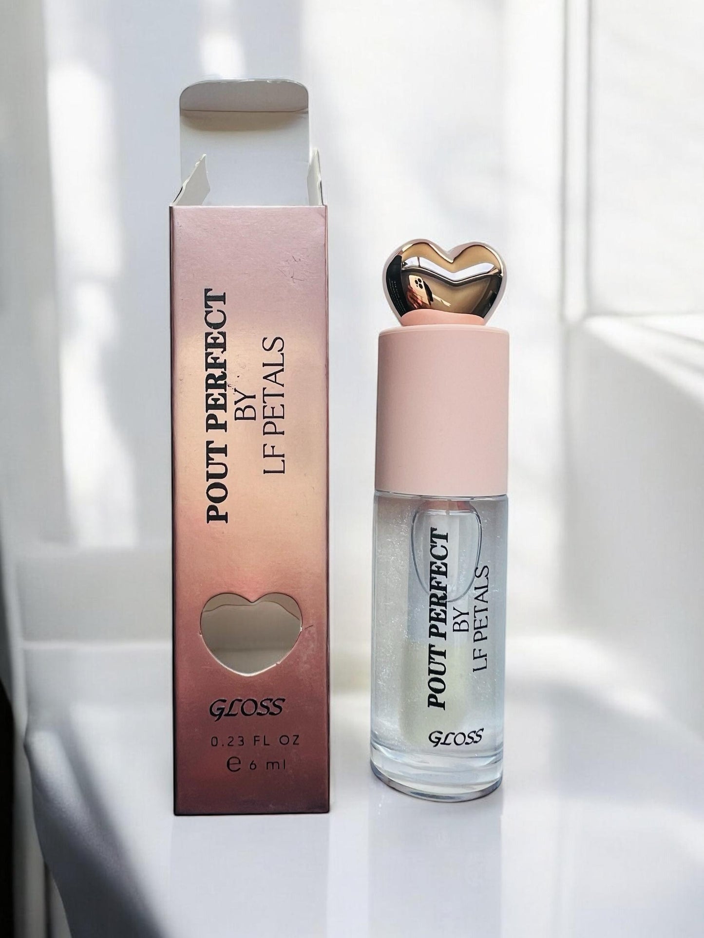 Mysterious "lite shimmer" Pout Perfect Gloss